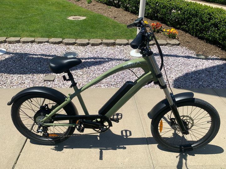 An Electric Chopper bike on a sidewalk