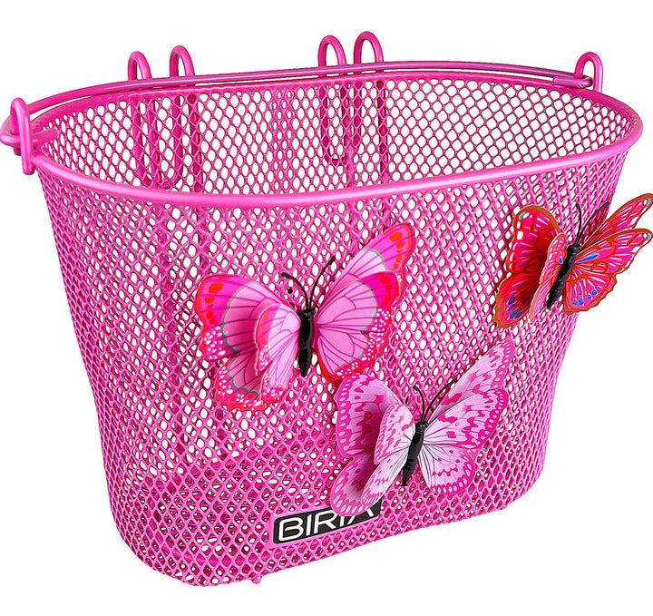 A pink children's bike basket with butterflies on it