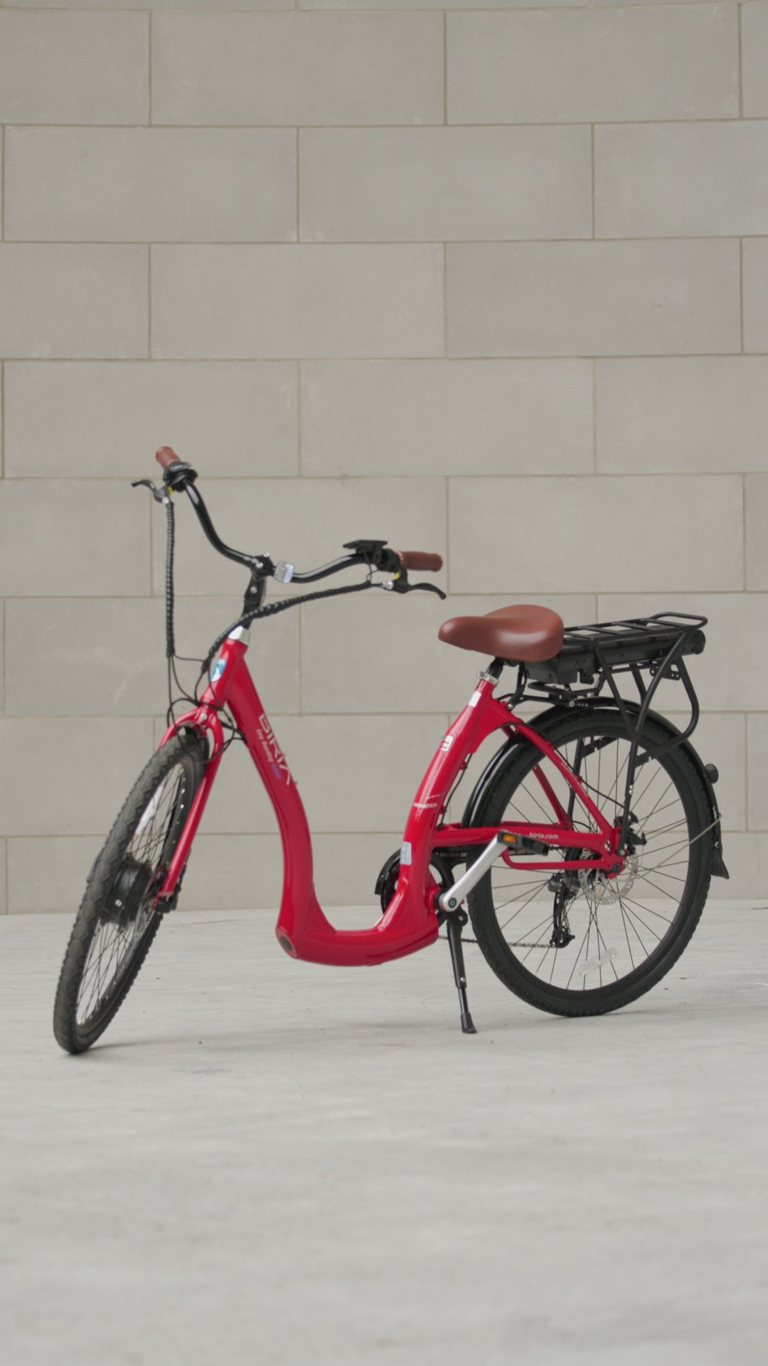 A promo video of a red electric easy board bike, showing the bike from different angles & ending with Biria's logo.